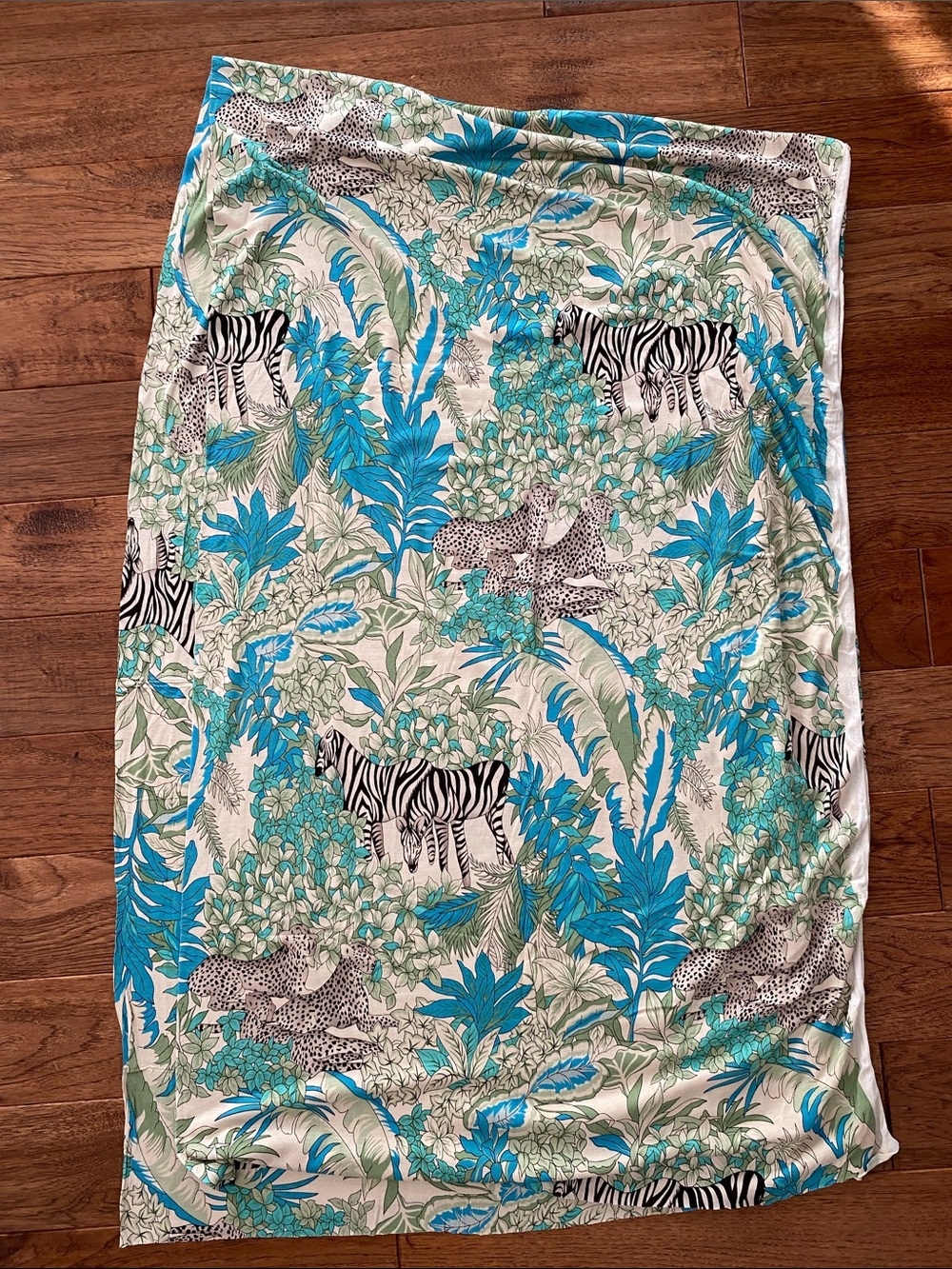 Floral & Safari Print Turquoise stretch jersey fabric